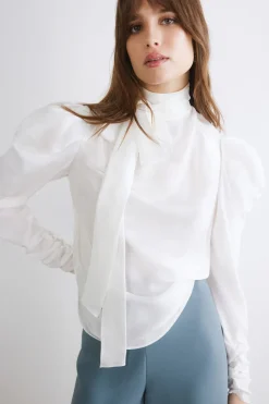 Blusa con fiocco