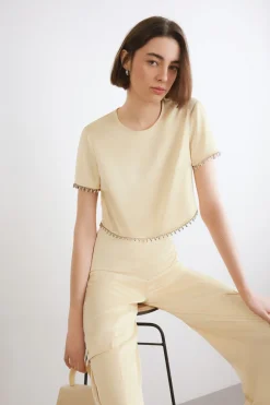 T-shirt con maniche corte gioiello